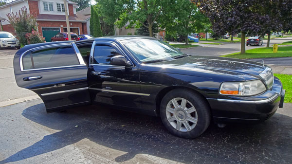 Lincoln Town Car Limousine back door open Lincoln Town Car Limousine back door open